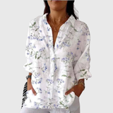 Olga | Light, colorful blouse with a print