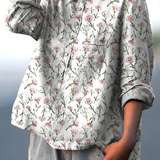 Zoe | Casual women's blouse with a pink spring floral motif