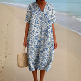 Alyssa - Ivory Dress Adorned with Porcelain Blue Floral Accents
